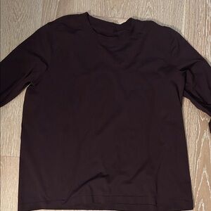NWOT lululemon athletica swiftly relaxed updated fit in black plum, size 10